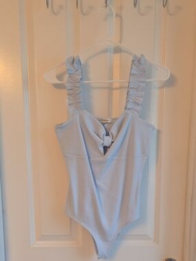 Francesca's Collections Light Blue Ruffle Strap Knot Front Bodysuit